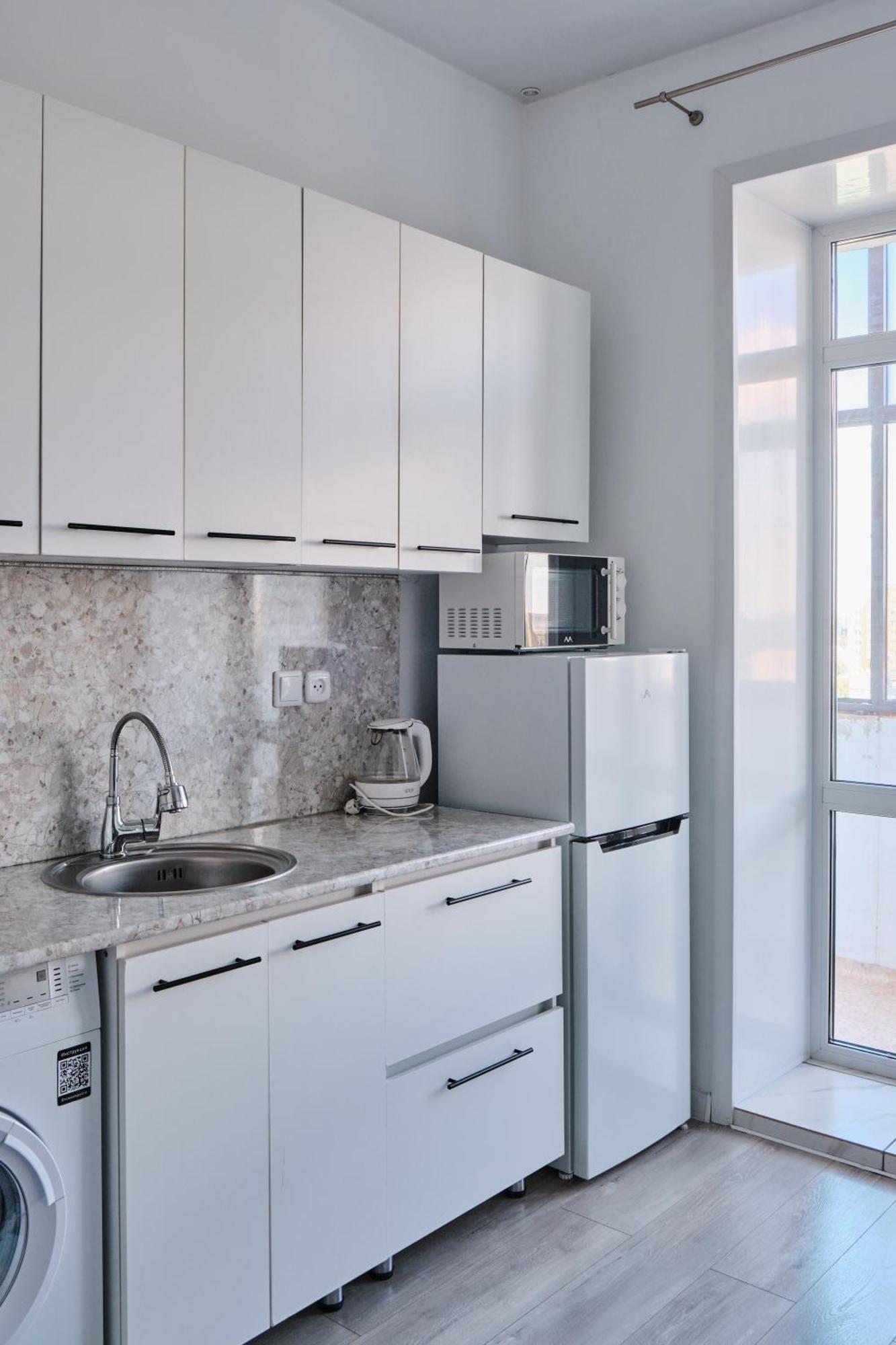 Seven City Apartments Semej Esterno foto